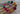Excavated polyhedra model set in video